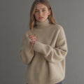 Rollkragenpullover Damen beige oversized mit weiten Ärmeln