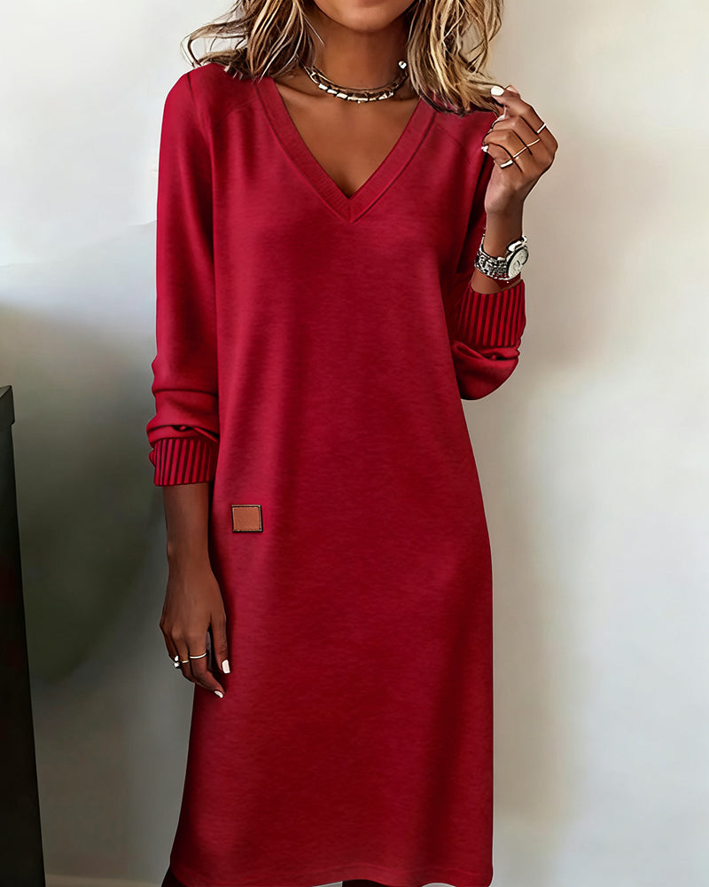 Elegantes Wickelkleid für Damen mit V-Ausschnitt und langen Ärmeln - 1 - Trendlinie