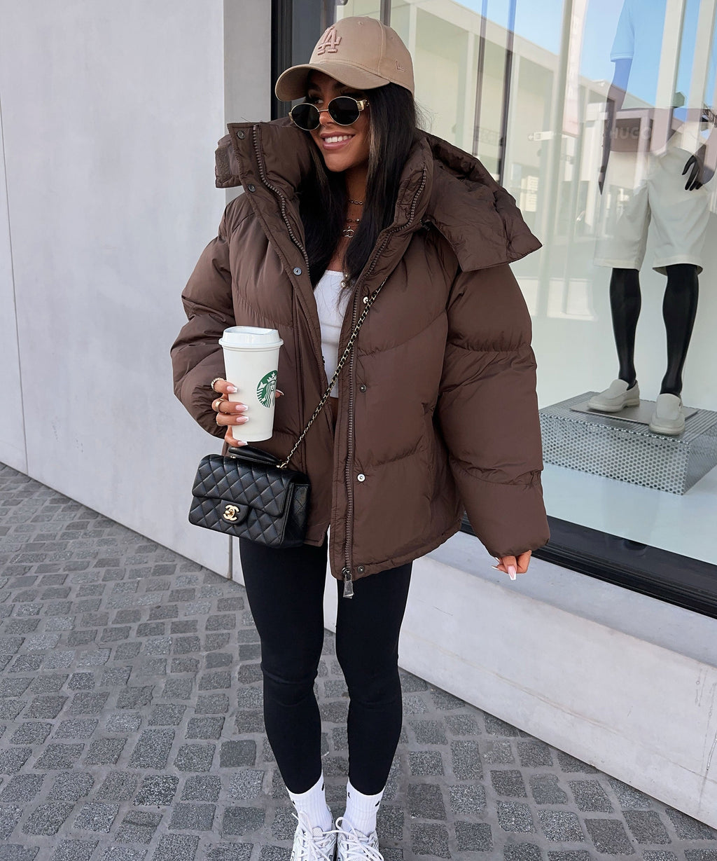 Damen Pufferjacke mit Kapuze im Oversize-Stil und praktischem Reißverschluss - 1 - Trendlinie