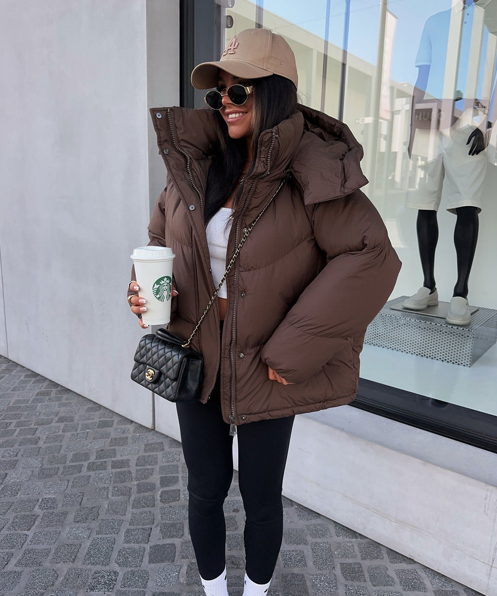 Damen Pufferjacke mit Kapuze im Oversize-Stil und praktischem Reißverschluss - 4 - Trendlinie