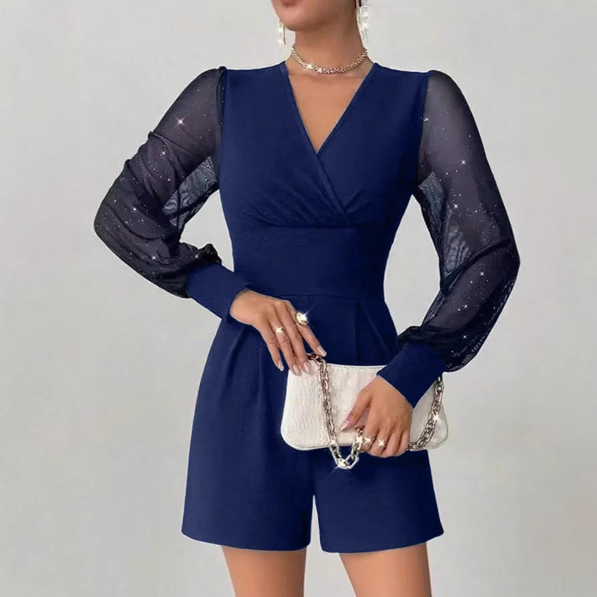 Eleganter Jumpsuit Damen mit Wickeldesign und langen Puffärmeln - 2 - Trendlinie