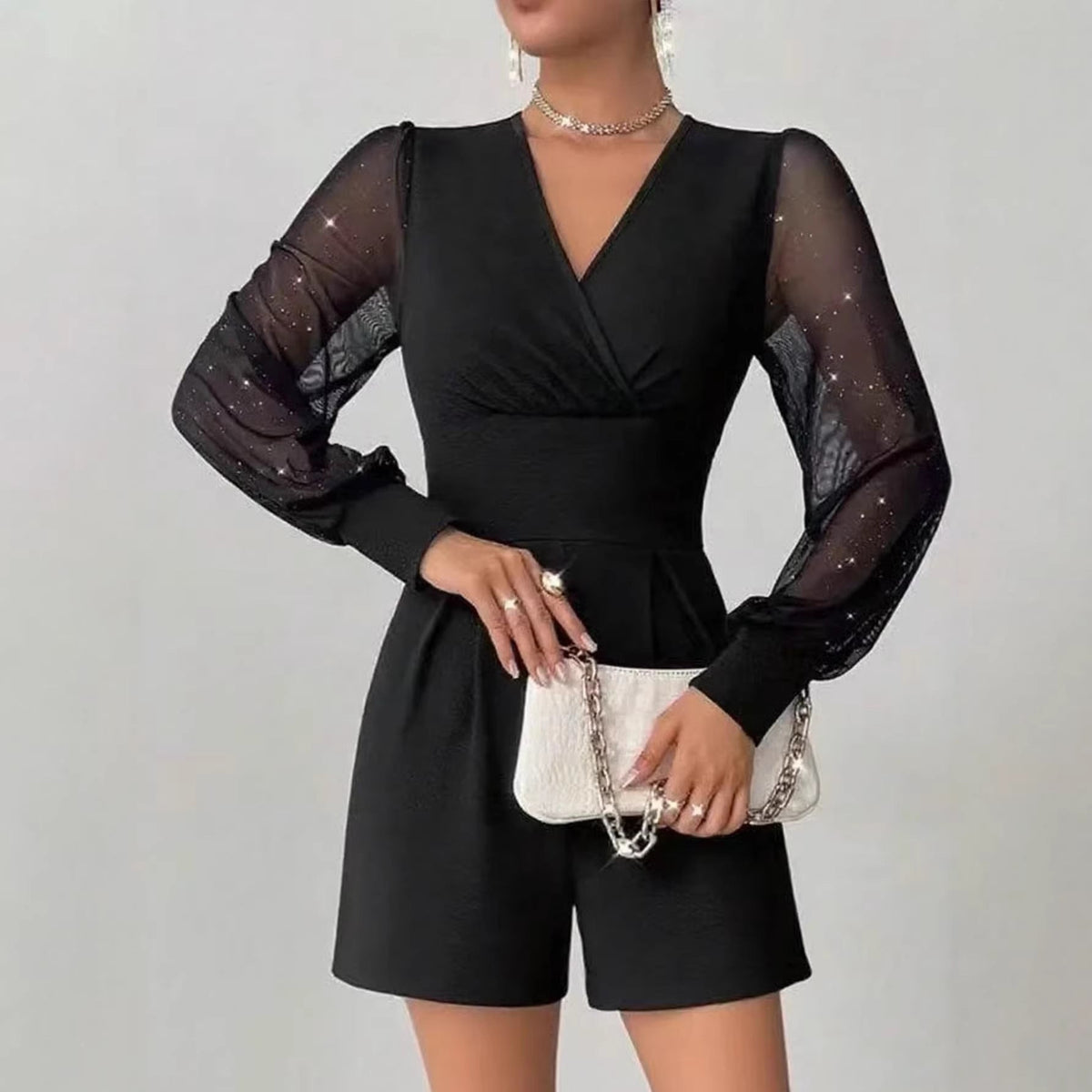 Eleganter Jumpsuit Damen mit Wickeldesign und langen Puffärmeln - 3 - Trendlinie